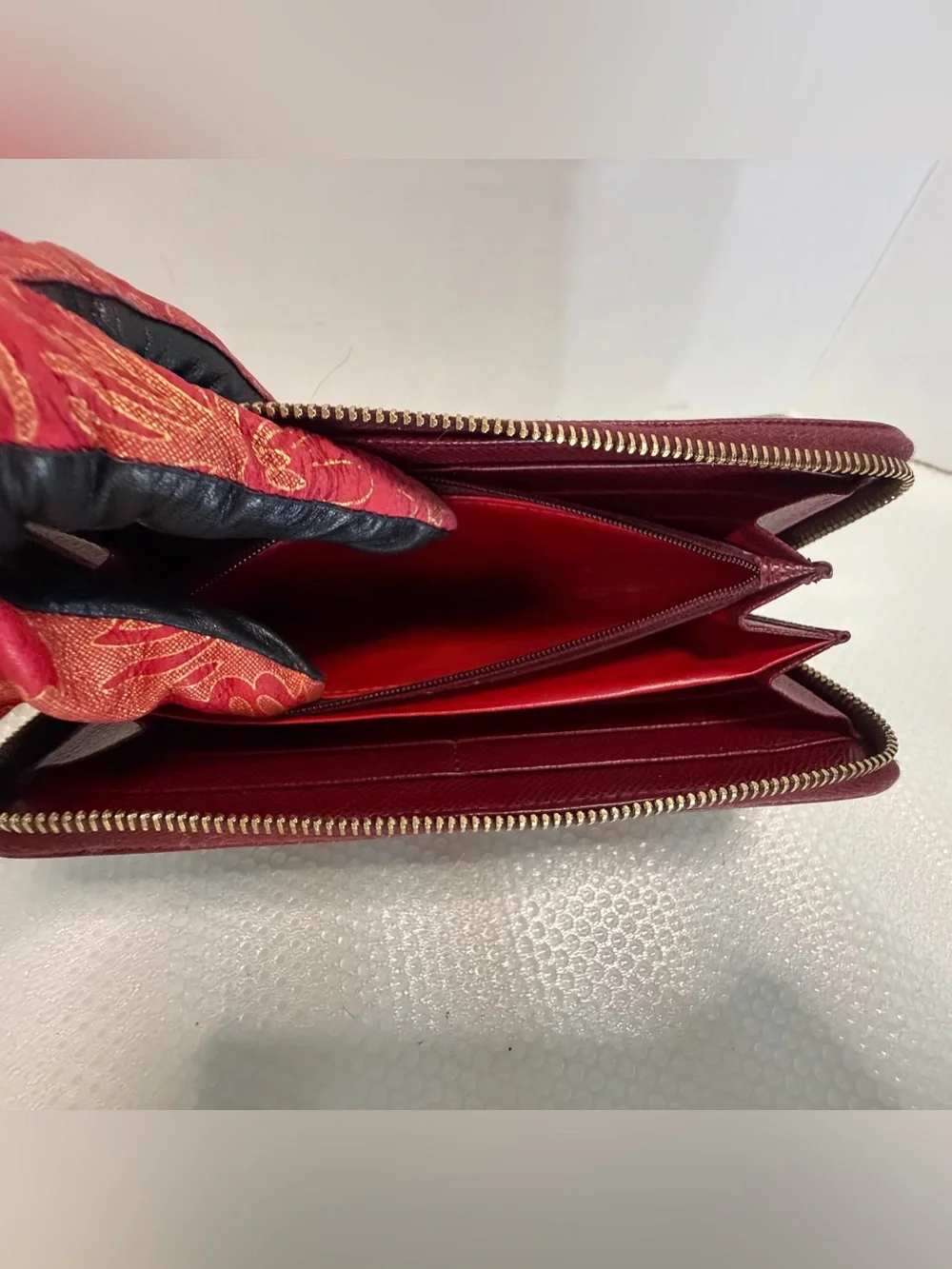 Dooney & Bourke Wine Textured Zip Wallet with Gold Plaque